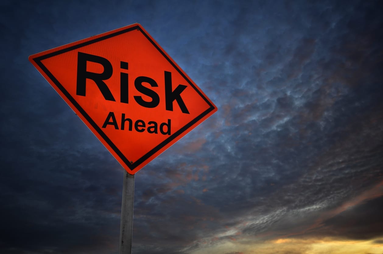 Risk warning road sign Risk warning road sign with storm background