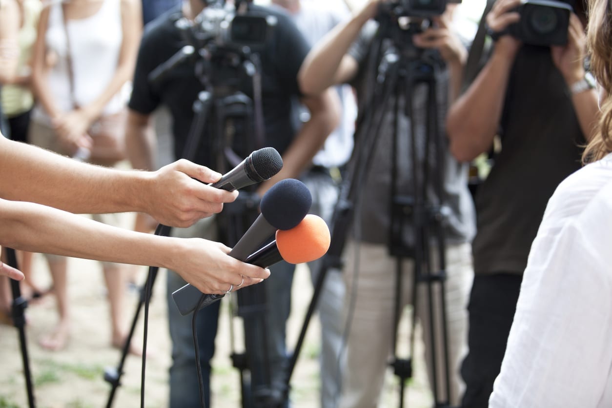 Interview using microphones.